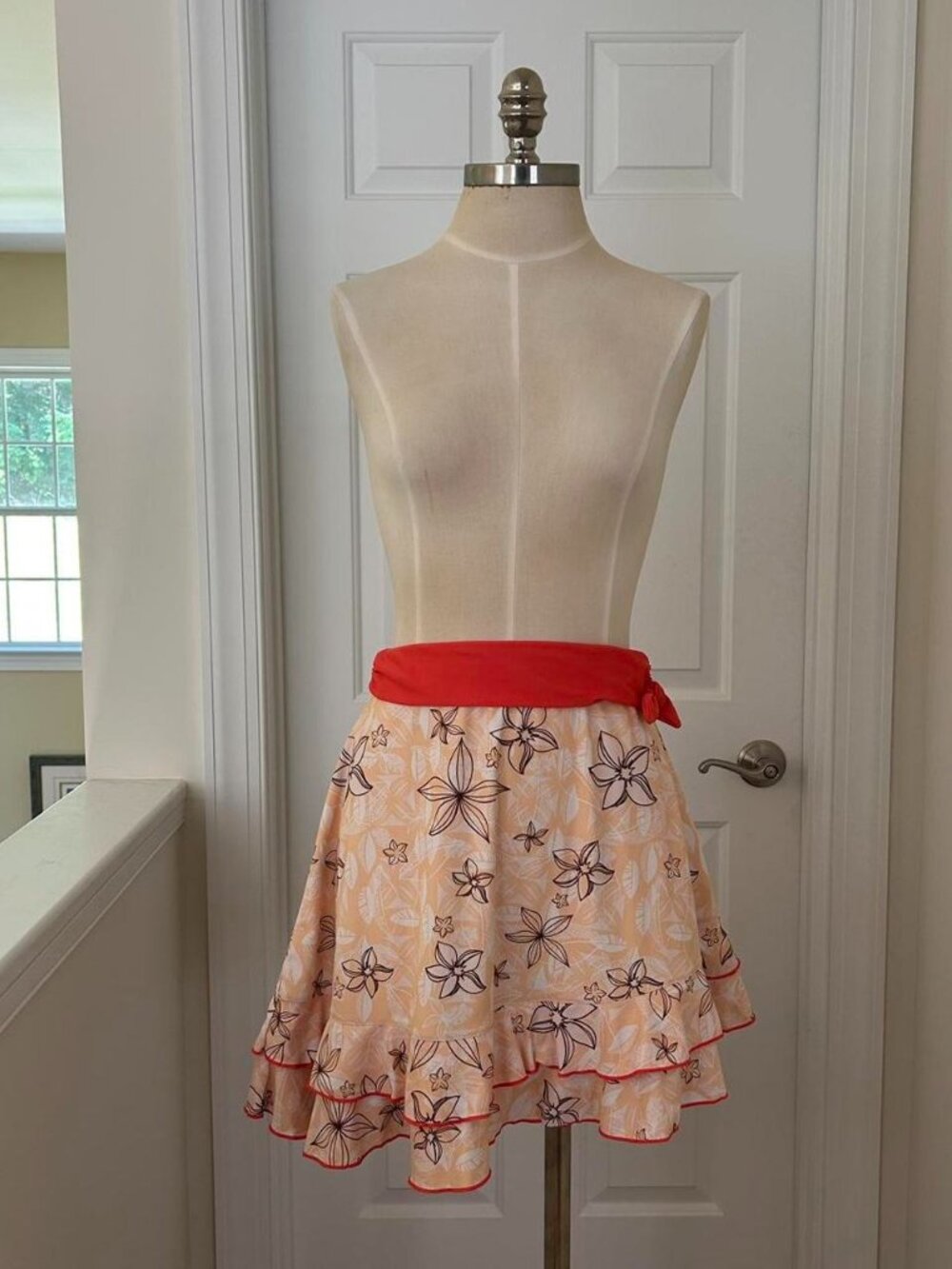 Disney Moana girls swim skirt orange floral skirt with ribbon waistband Size 13